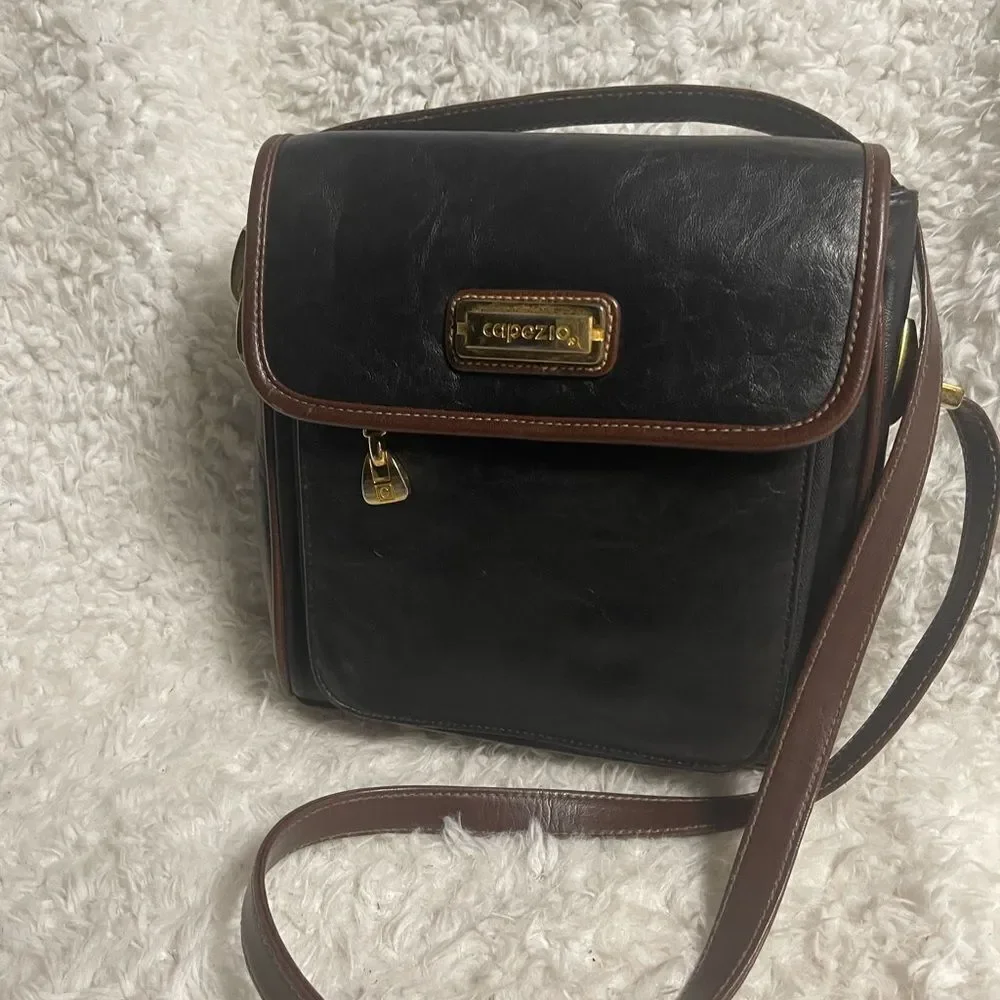 Capezio Black Leather Crossbody Bag with brown trim and gold tone hardwares